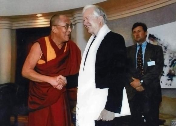 The Dalai Lama and President Jimmy Carter in 2002. file photo.