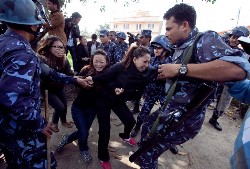 Nepalese police detaining exile Tibetans in Kathmandu in 2011. Photo- The Kathmandu Post