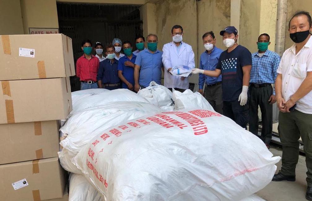 Staffs of the Dalai Lama Trust donates 500 PPE kit sets to the Tanda Hospital in Kangra District. May 12, 2020. Photo-Facebook