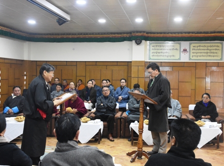 Tenzin Lungtok swearing in as the new Justice Commissioner with Chief Justice Commissioner Sonam Norbu Dagpo at the oath ceremony (photo- Kunsang Gashon) Phayul